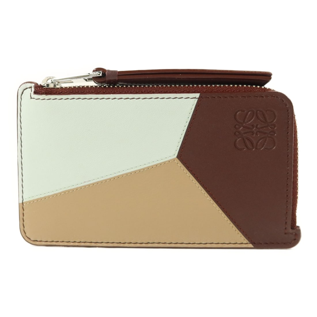 Calfskin Leather Card Case by Loewe in Brown and Blue: Calfskin Leather Card Case by Loewe in Brown and Blue This LOEWE Puzzle card case is crafted from calfskin leather in a brown and blue color combination. Designed for unisex use, it features a sleek, 