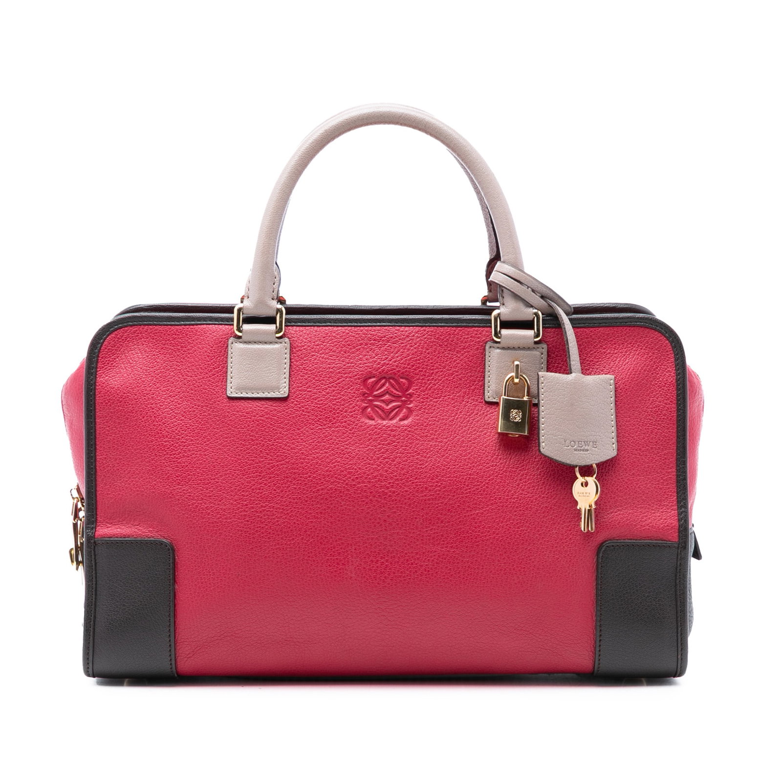 Loewe Amazona 36 Handbag in Tricolor Leather with Top Zip: Loewe Amazona 36 Handbag in Tricolor Leather with Top Zip The Loewe Amazona 36 is a tricolor leather handbag featuring rolled leather handles, a top zip closure, and an interior zip pocket. Made in Sp