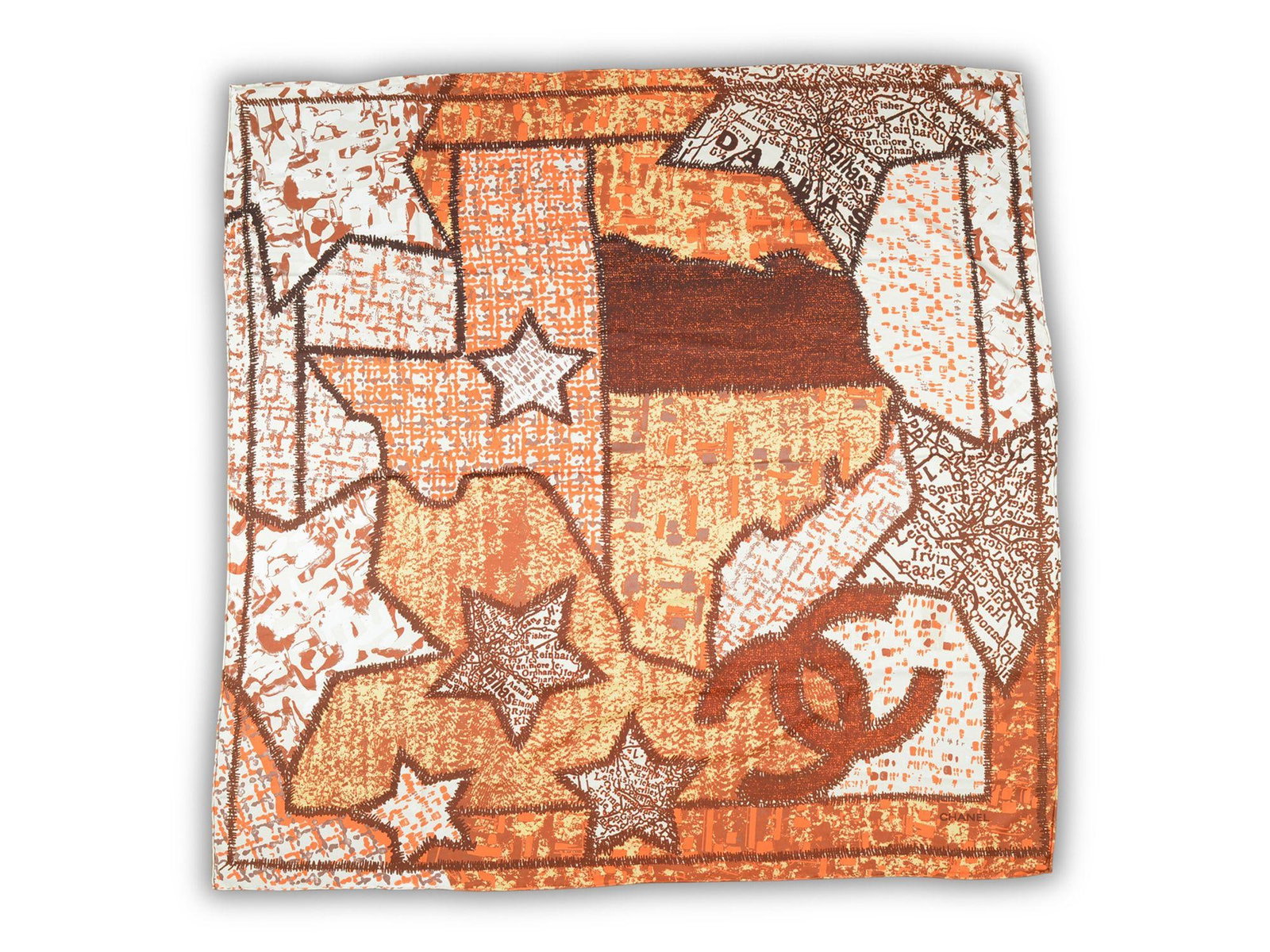 Texas Map Print Silk Scarf by Chanel in Brown Beige Orange: Texas Map Print Silk Scarf by Chanel in Brown Beige Orange Chanel brown, beige, and orange silk shawl featuring a Texas map design. The shawl has hand-rolled edges and includes the original care tag. 