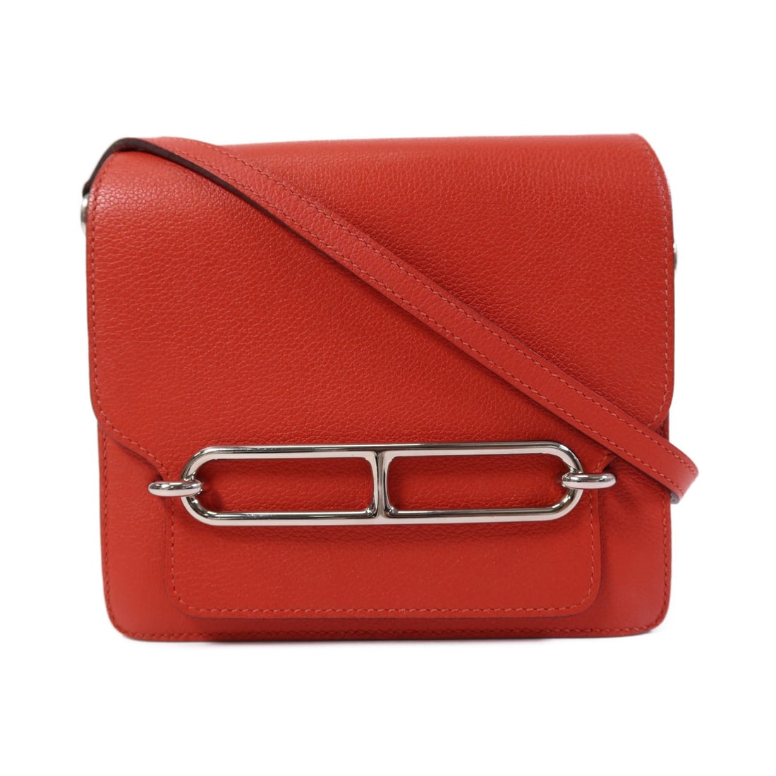 Hermes Roulis Mini Red Evercolour Calfskin Shoulder Bag Palladium Hardware: Hermes Roulis Mini Red Evercolour Calfskin Shoulder Bag Palladium Hardware This Hermes Roulis Mini shoulder bag is crafted from Evercolour calfskin leather in a Rouge Tomate red shade. Designed for wo