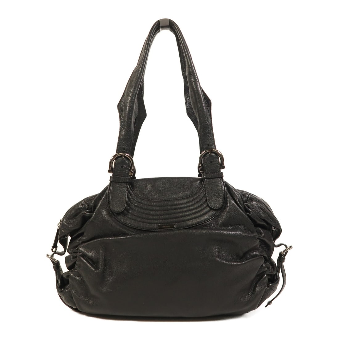 Black Calfskin Leather Shoulder Bag by Salvatore Ferragamo: Black Calfskin Leather Shoulder Bag by Salvatore Ferragamo This Salvatore Ferragamo shoulder bag is crafted from black calfskin leather, offering a sophisticated and durable design. Made in Italy, it 