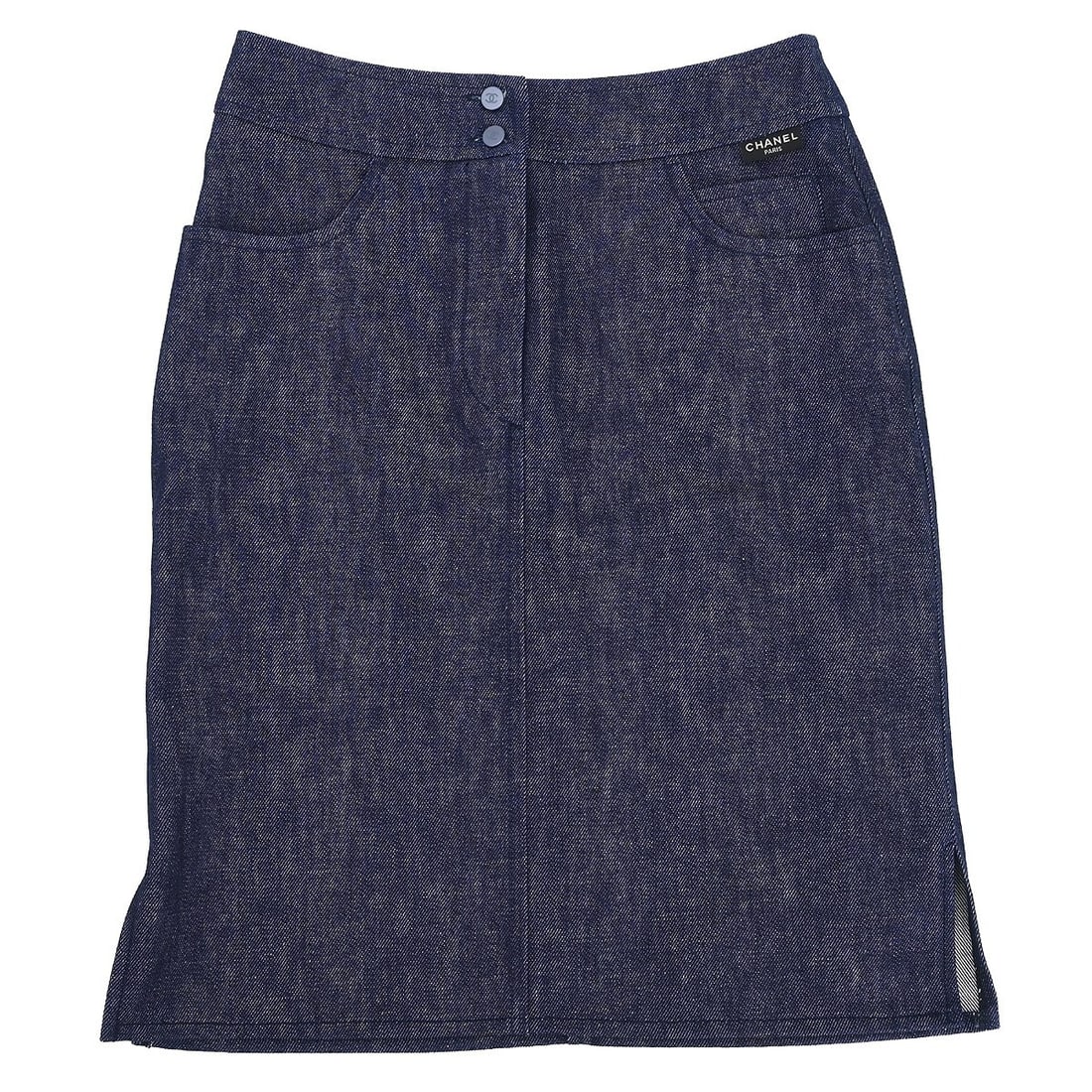 Chanel Vintage Indigo Denim Skirt with Logo Accents Size 36: Chanel Vintage Indigo Denim Skirt with Logo Accents Size 36 This Chanel denim skirt is a timeless piece, crafted from 100% cotton in a rich indigo color. It features a convenient zip closure and showc