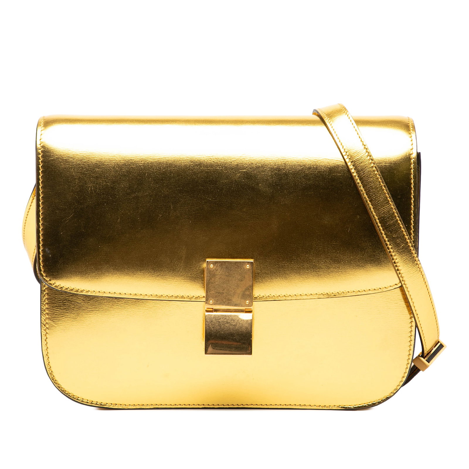Celine Classic Box Medium Leather Crossbody Bag with Gold Tone Details: Celine Classic Box Medium Leather Crossbody Bag with Gold Tone Details The Celine Medium Calfskin Classic Box is a crossbody bag crafted from leather, featuring a flat leather strap, a front flap with