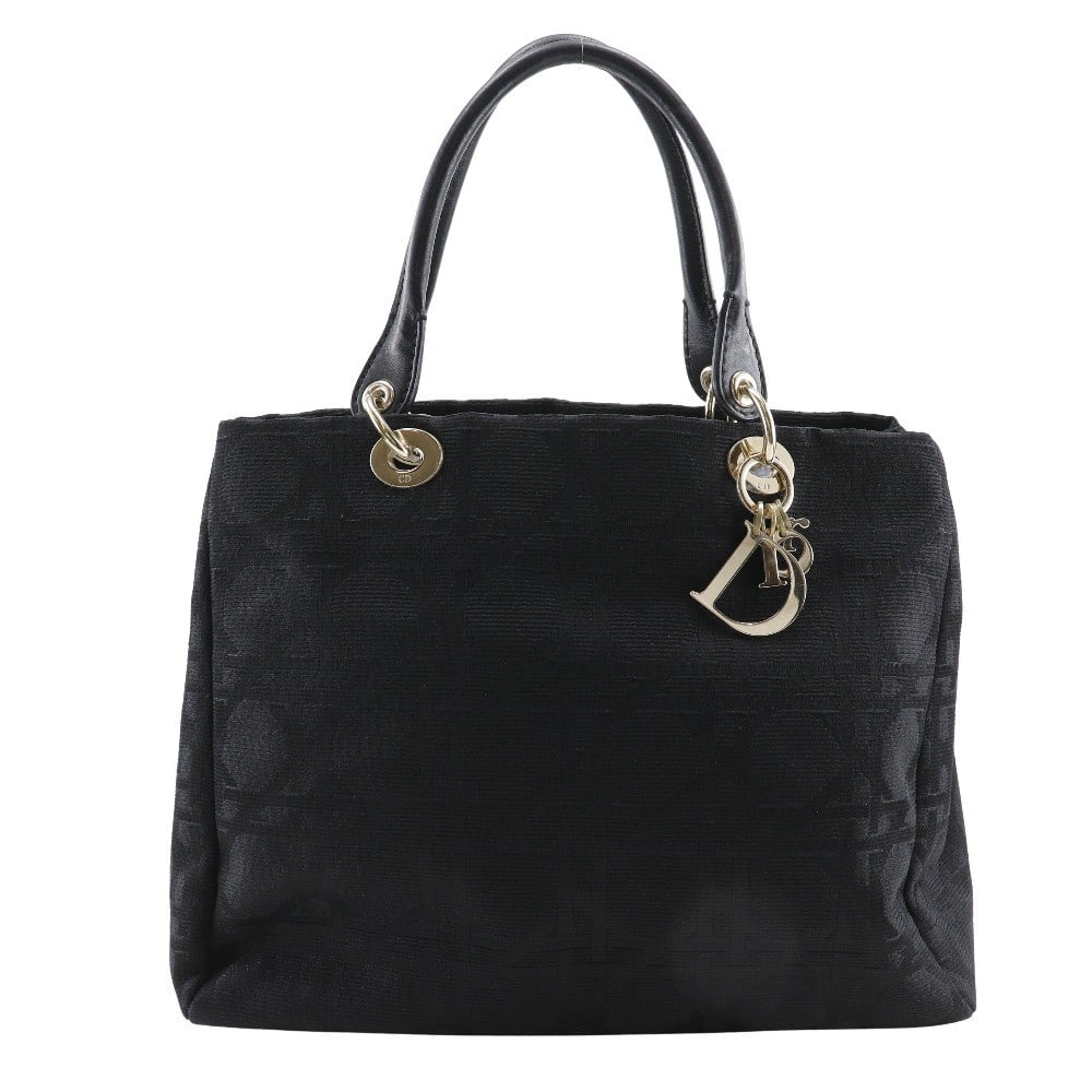 Black Canvas Lady Cannage Tote by Christian Dior for Women: Black Canvas Lady Cannage Tote by Christian Dior for Women This Christian Dior Lady Cannage Matelasse bag is crafted from black canvas and designed for women. It features a spacious interior, with min