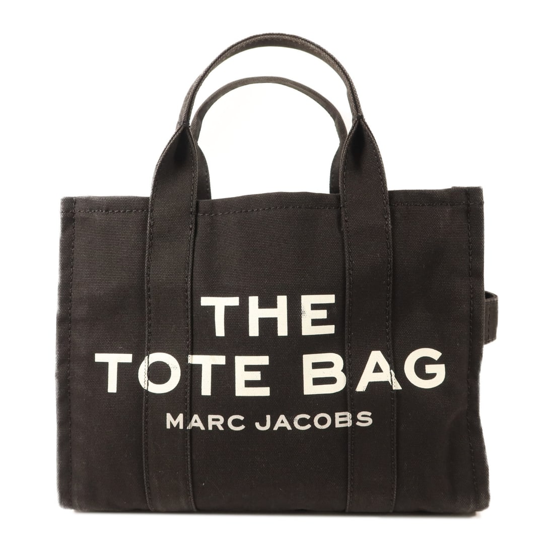Black Canvas Marc Jacobs Tote Bag: Black Canvas Marc Jacobs Tote Bag This Marc Jacobs tote bag is crafted from durable black canvas and features a classic, versatile design. It offers ample space for daily essentials, making it suitabl