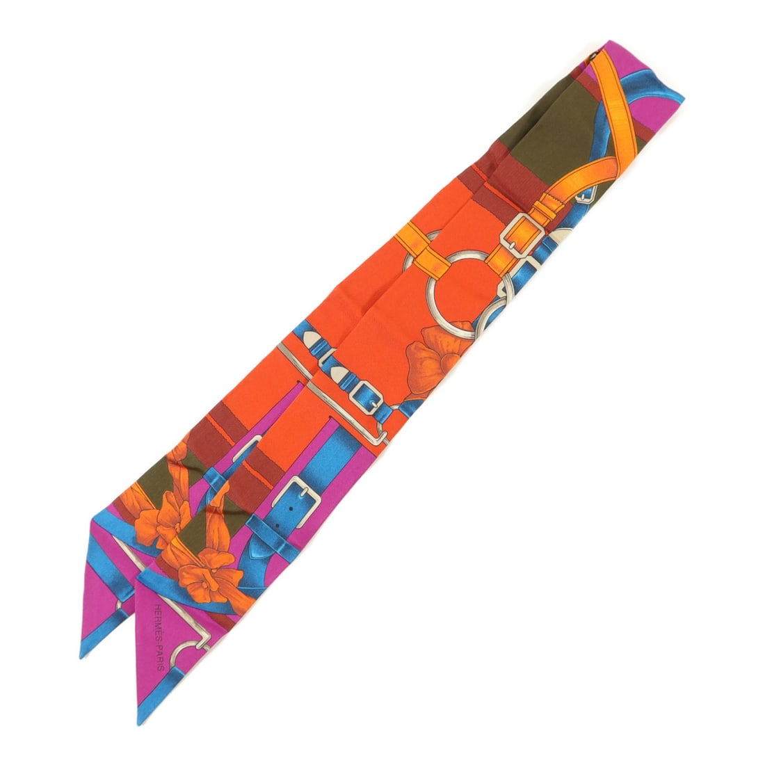 Hermes silk Twilly multicolor women's scarf: Hermes silk Twilly multicolor women's scarf This Hermes Twilly scarf is crafted from luxurious silk and features a vibrant multicolor design. Made in France, it offers a sophisticated accessory option