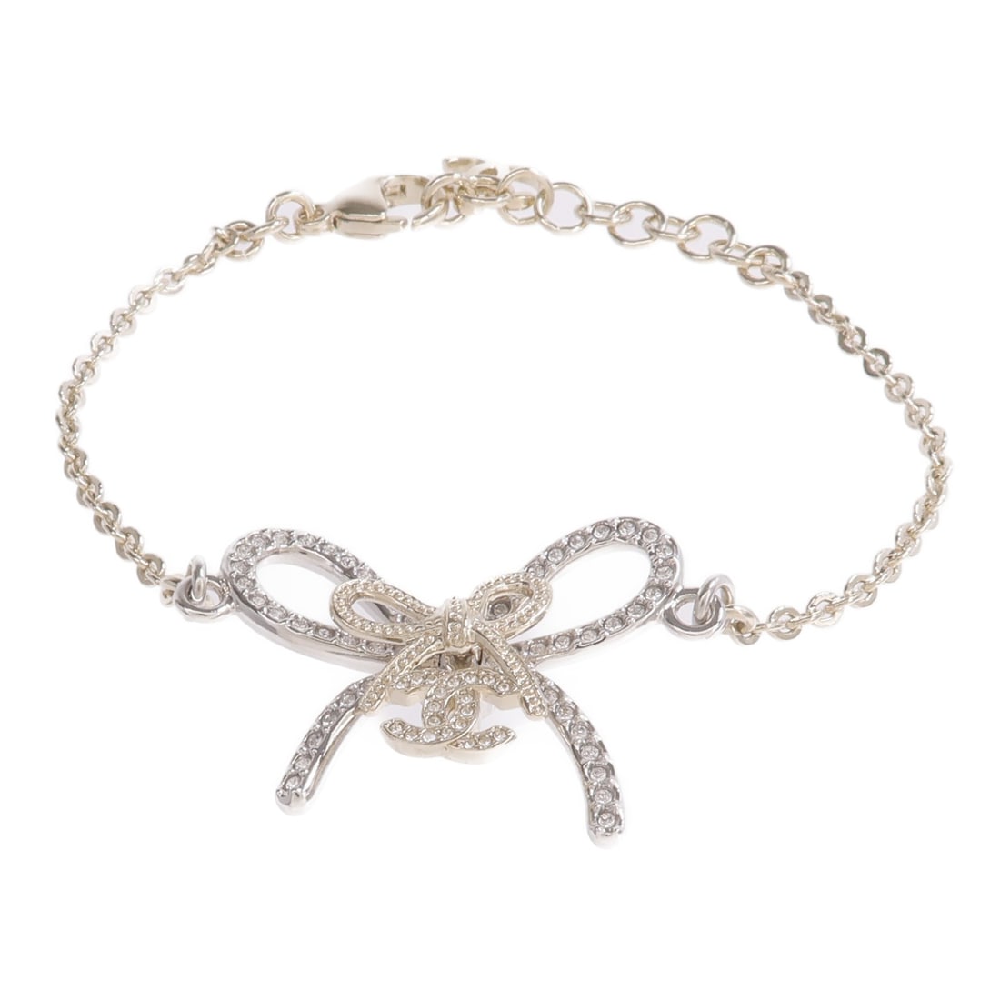 CHANEL Gold Tone CC Metal Bracelet: CHANEL Gold Tone CC Metal Bracelet This CHANEL CC bracelet features a chic gold-tone finish, crafted from metal with no main stone. Designed for women, it showcases the iconic CC logo and is made in F