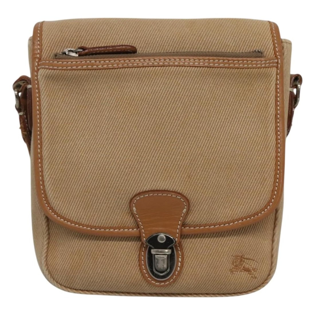 Canvas Blue Label crossbody by Burberry in beige: Canvas Blue Label crossbody by Burberry in beige This Burberry Blue Label shoulder bag is crafted from beige canvas and designed for unisex use. The bag features a structured silhouette with an adjust