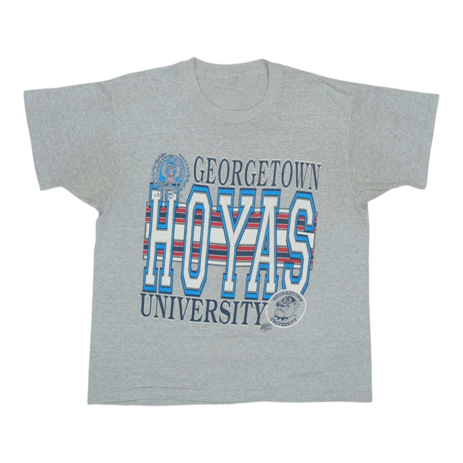 Vintage 1980s Grey Georgetown Hoyas Poly Cotton Graphic Shirt: Vintage 1980s Grey Georgetown Hoyas Poly Cotton Graphic Shirt This is an original vintage 1980s Georgetown University Hoyas shirt featuring front and back graphics. Made from a 50/50 poly-cotton blend