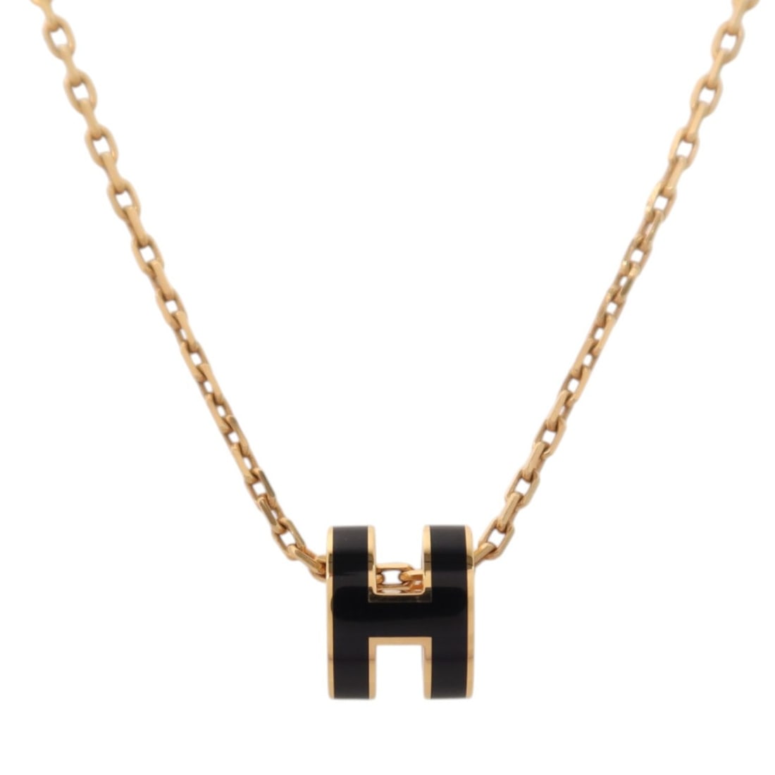 Hermes Mini Pop H enamel necklace black rose gold tone: Hermes Mini Pop H enamel necklace black rose gold tone This Hermes Mini Pop H necklace features a sleek black enamel pendant complemented by rose gold-tone metal accents. Designed for women, this eleg