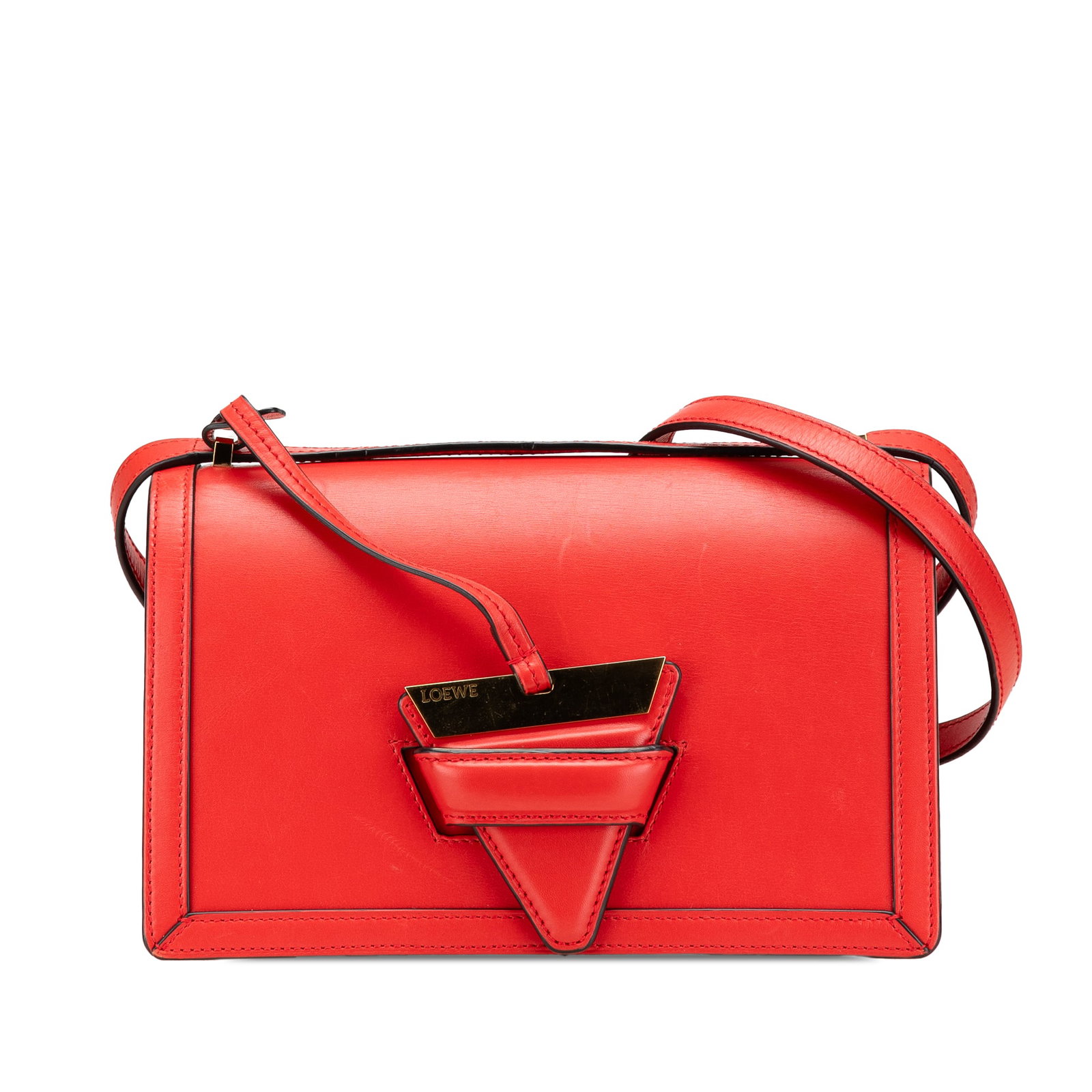 LOEWE Medium Barcelona Crossbody Bag in Red Leather: LOEWE Medium Barcelona Crossbody Bag in Red Leather The LOEWE Medium Leather Barcelona Crossbody is a stylish and functional bag crafted from premium calf leather. This elegant piece features a flat l