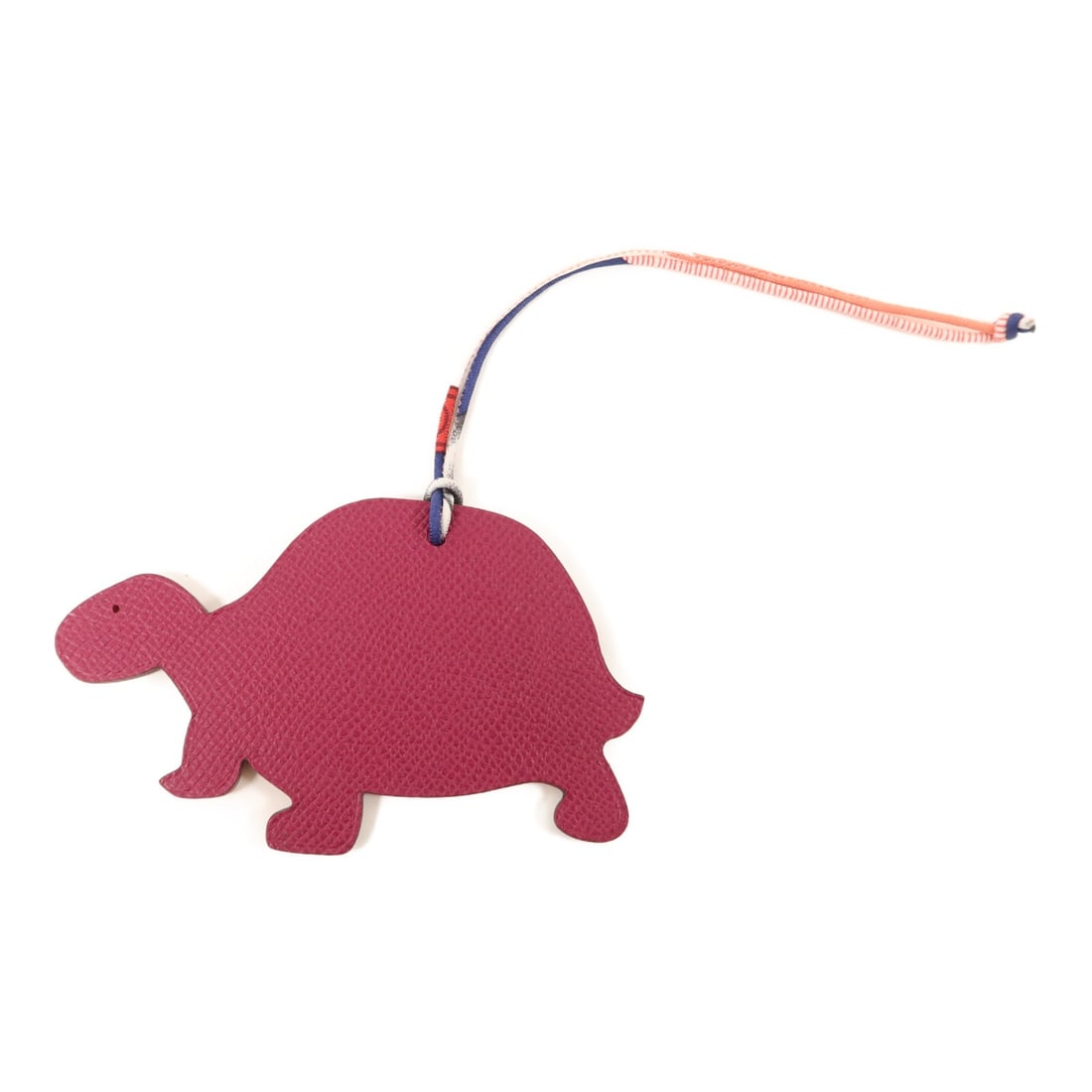 Hermes Turtle Bag Charm Purple Epsom and Clemence Leather: Hermes Turtle Bag Charm Purple Epsom and Clemence Leather This Hermes Turtle Charm is crafted from Epsom and Clemence calfskin leather in a rich purple hue. Designed for women, this accessory adds a p