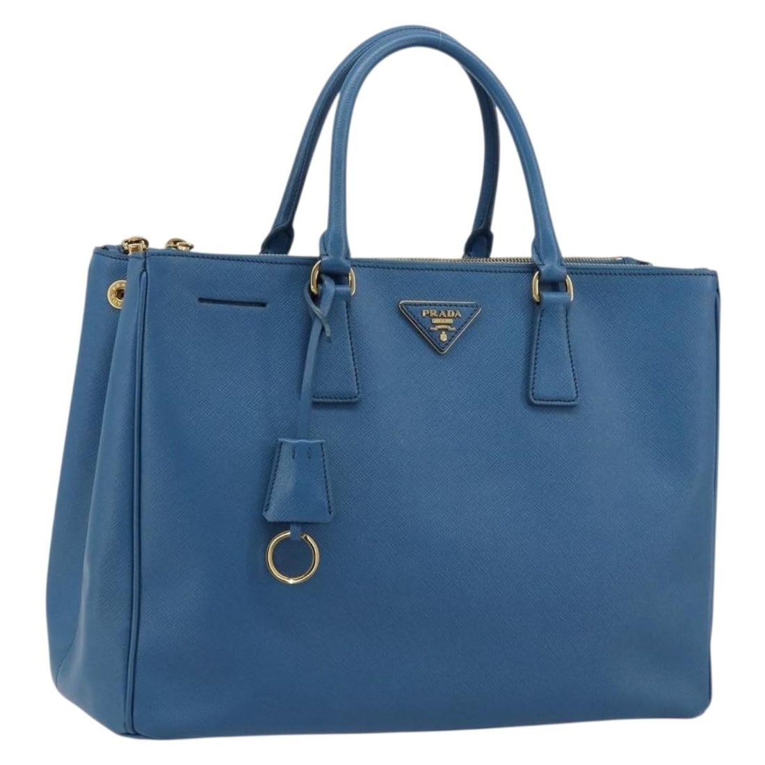 Prada Saffiano Leather Blue Gold Galleria Handbag with Clochette: Prada Saffiano Leather Blue Gold Galleria Handbag with Clochette This PRADA Galleria handbag is crafted from signature Saffiano leather in a blue and gold color combination. Made in Italy, the bag fea
