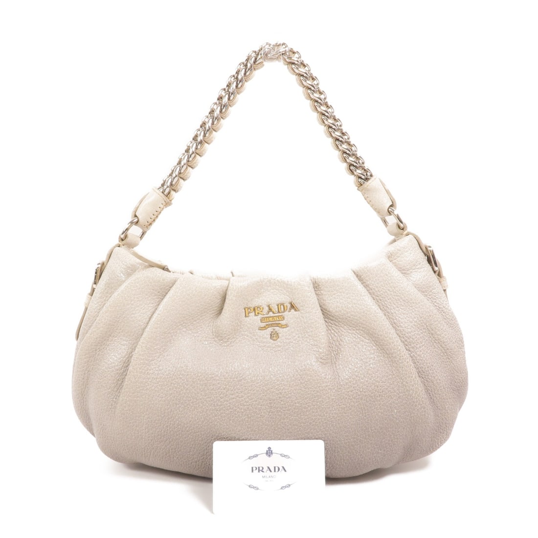 Prada BR3828 Calfskin Silver Shoulder Bag: Prada BR3828 Calfskin Silver Shoulder Bag This Prada shoulder bag is crafted from silver calfskin leather, offering a sleek and sophisticated look. Designed for women, it features a chain shoulder str