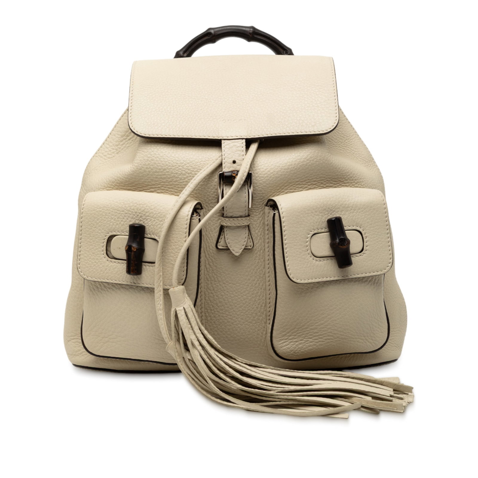 White Leather Gucci Bamboo Backpack with Tassel and Flap Pockets: White Leather Gucci Bamboo Backpack with Tassel and Flap Pockets This Gucci Leather Bamboo Tassel Backpack features a white leather body with a distinctive bamboo top handle and adjustable flat leathe
