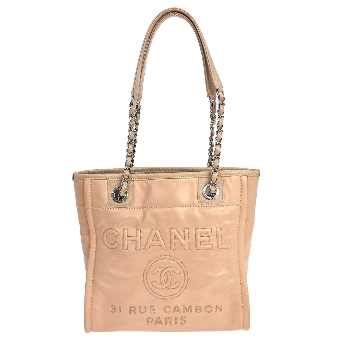 Small Chanel Deauville Tote in Pink Canvas with Double Handles: Small Chanel Deauville Tote in Pink Canvas with Double Handles This Chanel Deauville shoulder tote bag is crafted from pink canvas with matching double handles and features a magnetic closure. The int