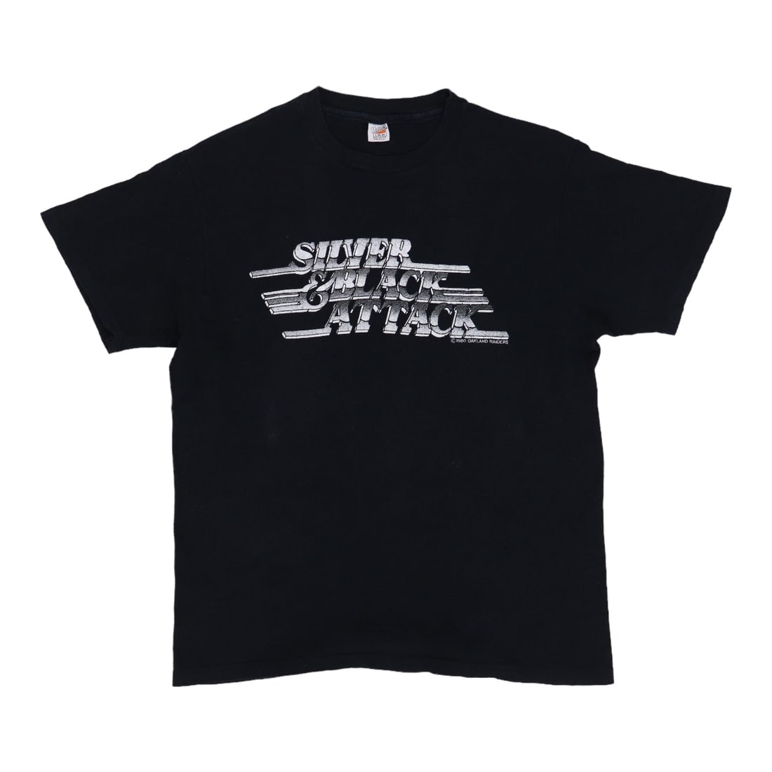 Vintage 1980 Oakland Raiders Silver and Black Attack Cotton Shirt: Vintage 1980 Oakland Raiders Silver and Black Attack Cotton Shirt This is an original vintage 1980 Oakland Raiders Silver & Black Attack shirt. Made from 100% cotton, the shirt features classic black 