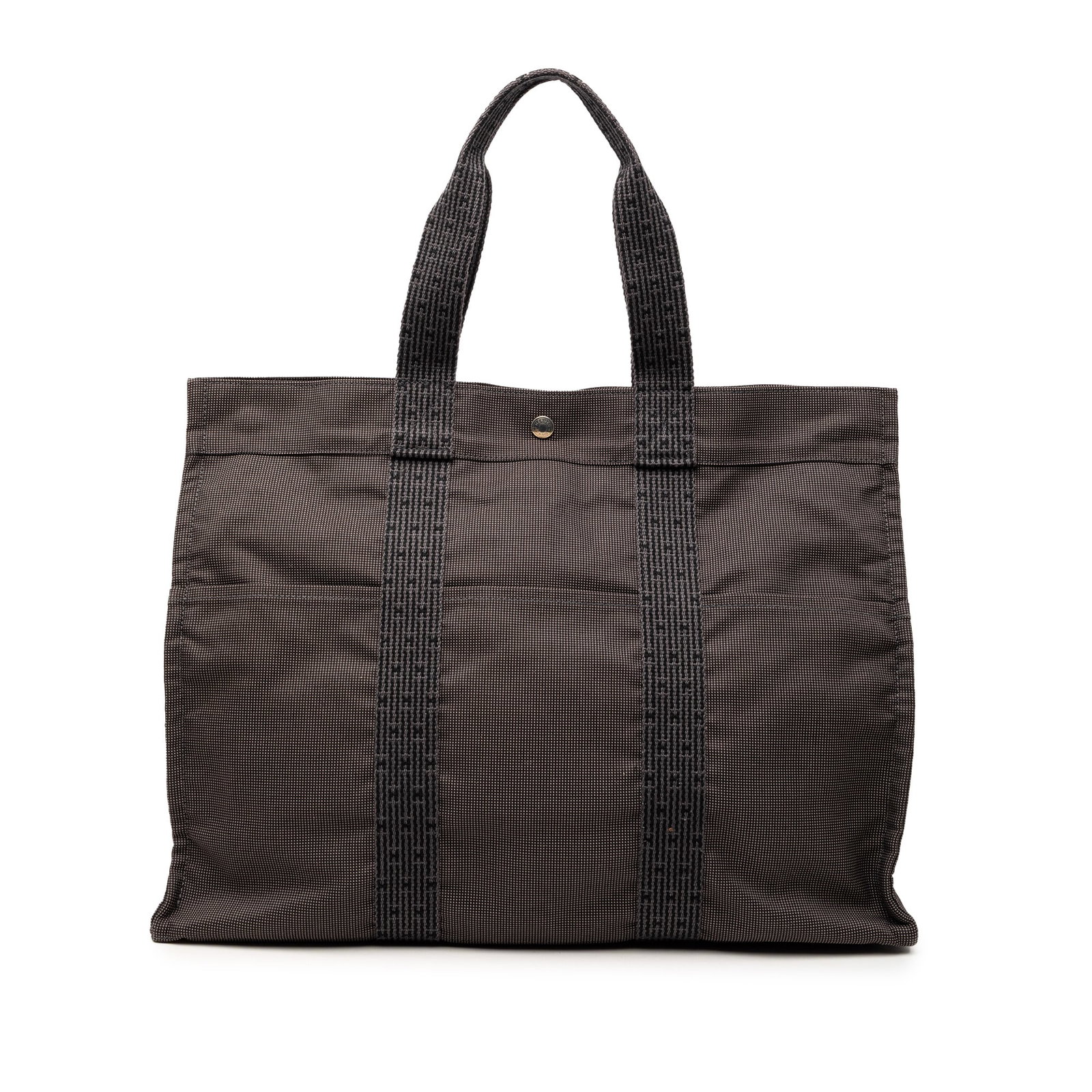 Herline GM Gray Canvas Tote Bag with Zip Top and Slip Pockets: Herline GM Gray Canvas Tote Bag with Zip Top and Slip Pockets The Hermes Herline GM is a gray canvas bag featuring flat handles, a top zip closure, exterior front and back slip pockets, and an interio