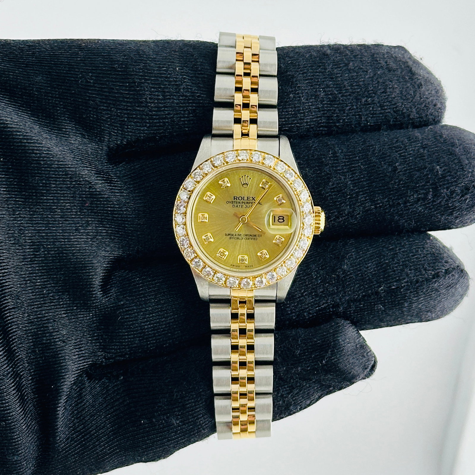 Datejust Lady 69173 Watch Champagne Diamond Dial D-Link Jubilee Bracelet: Datejust Lady 69173 Watch Champagne Diamond Dial D-Link Jubilee Bracelet Rolex Datejust Lady wristwatch featuring an Aftermarket champagne diamond dial and a D-Link Jubilee bracelet. The bezel is set 