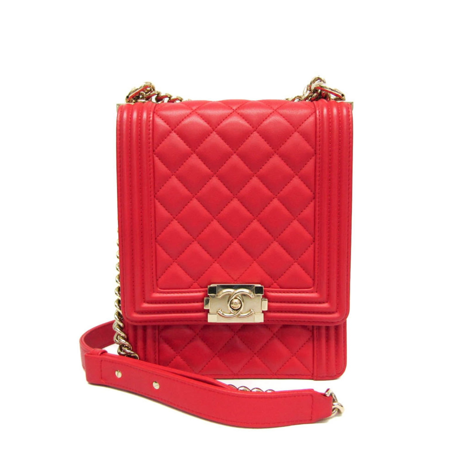 Chanel North South Boy Red Quilted Leather Flap Shoulder Bag: Chanel North South Boy Red Quilted Leather Flap Shoulder Bag This Chanel North South Boy Flap Bag features luxurious quilted calfskin leather in a striking red color. Designed for women, the bag showc
