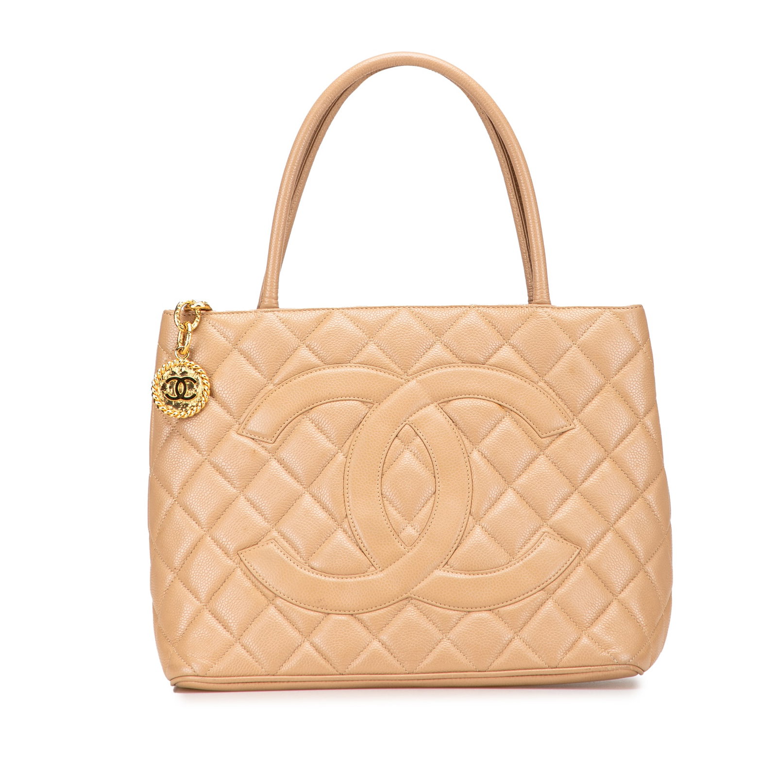 Chanel Caviar Medallion Tote Brown Leather Bag Italy: Chanel Caviar Medallion Tote Brown Leather Bag Italy This exquisite Chanel Caviar Medallion Tote is crafted from luxurious quilted caviar leather in a rich brown hue. It features a practical exterior 