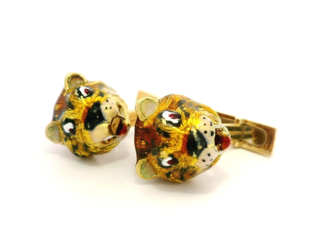 Vintage 18k Yellow Gold Multi Color Enamel Tiger Leopard Cufflinks: Vintage 18k Yellow Gold Multi Color Enamel Tiger Leopard Cufflinks These vintage cufflinks are crafted from solid 18k yellow gold and feature a stunning multi-color enamel work depicting tiger and leo