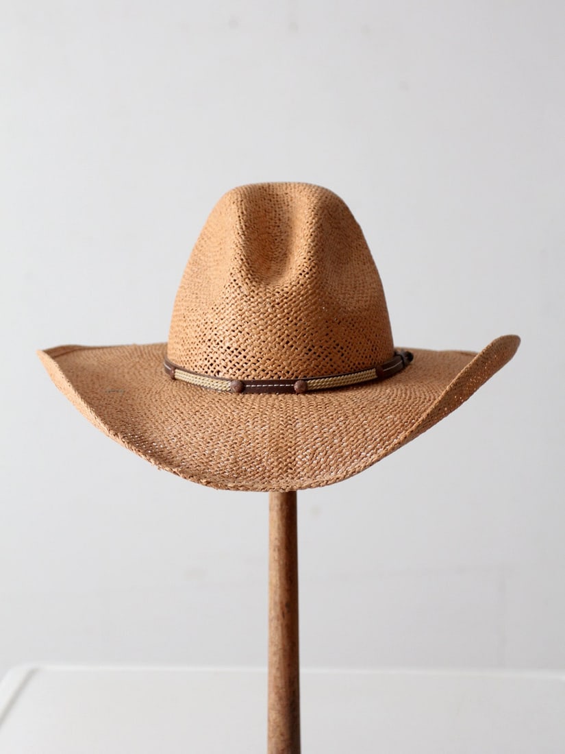 Vintage Som-Her Straw Cowboy Hat with Leather Hatband: Vintage Som-Her Straw Cowboy Hat with Leather Hatband This vintage Som-Her straw cowboy hat from Mexico features a brown woven leather hatband, blending timeless Western style with natural straw craft