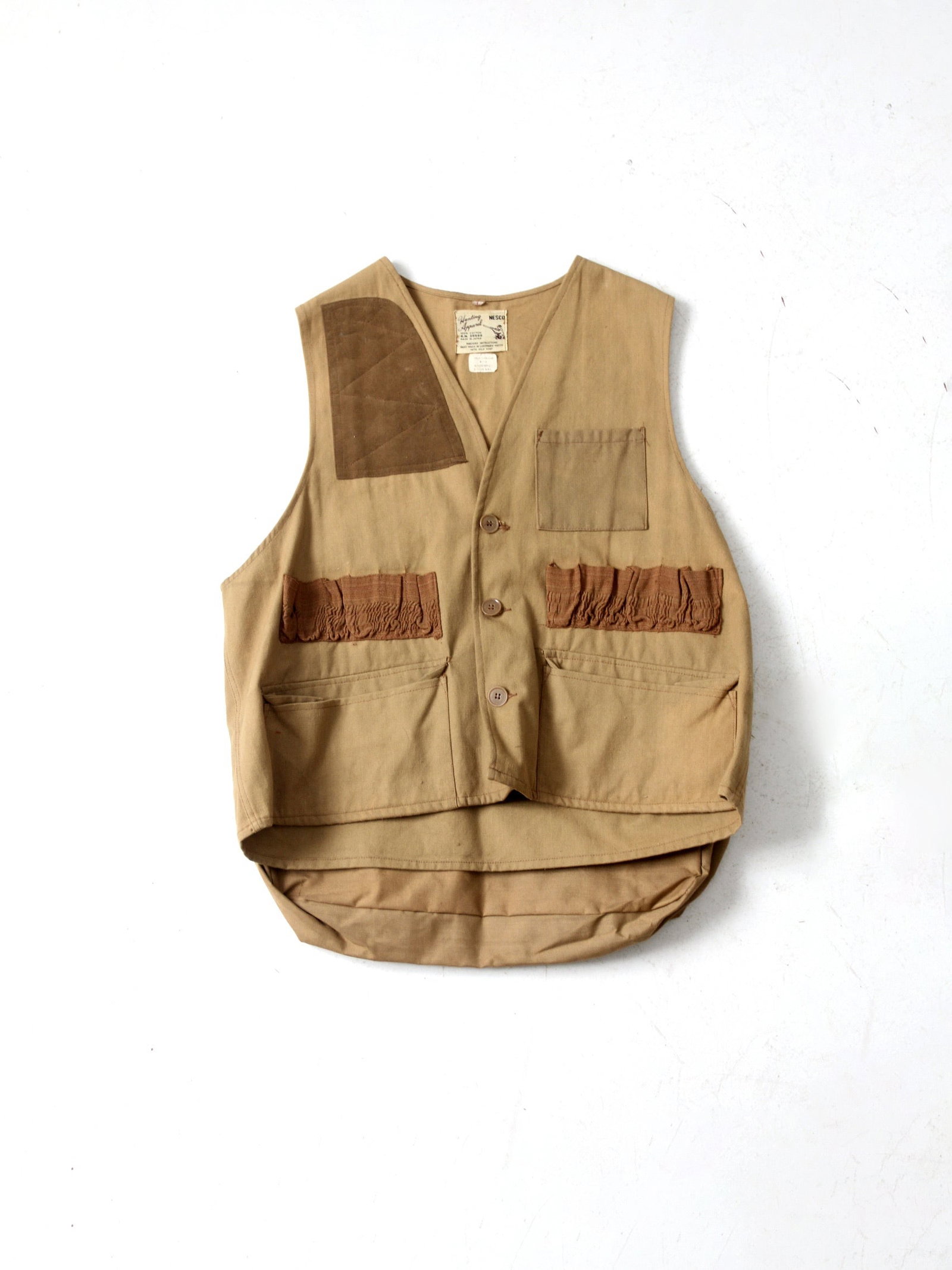 1970s Vintage Nesco Canvas Duck Hunting Vest with Ammo Pockets: 1970s Vintage Nesco Canvas Duck Hunting Vest with Ammo Pockets Discover this authentic 1970s vintage Nesco hunting vest, designed for functionality and durability. Constructed from sturdy canvas duck 