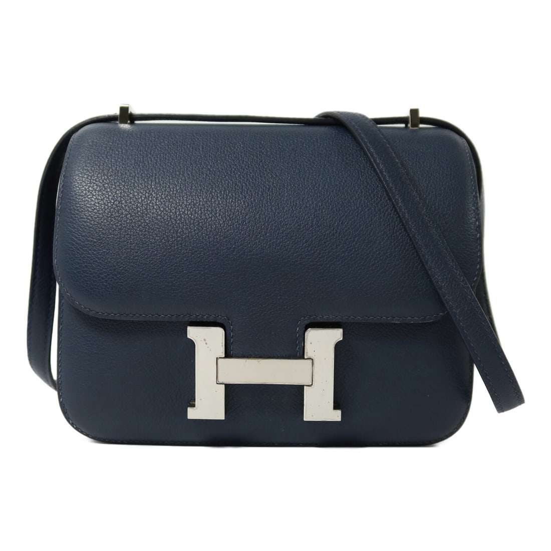 Hermes Constance Mini Blue Evercolor Leather Shoulder Bag Palladium Hardware: Hermes Constance Mini Blue Evercolor Leather Shoulder Bag Palladium Hardware This Hermes Constance Mini shoulder bag is crafted from Evercolor calfskin leather in Bleu de Malte. It features a sleek, c