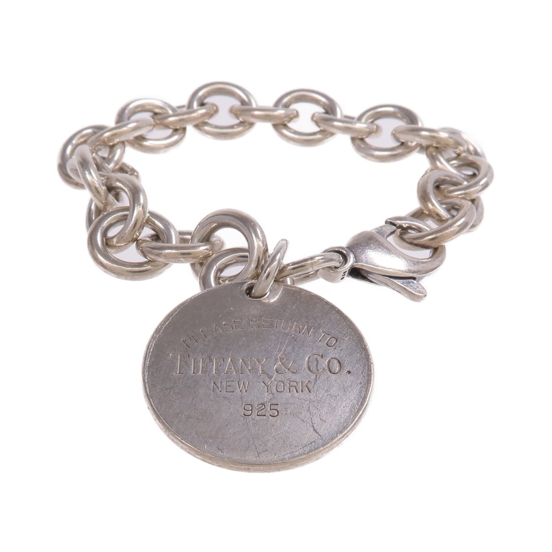 Sterling Silver 925 Bracelet by TIFFANY&CO United States: Sterling Silver 925 Bracelet by TIFFANY&CO United States This Tiffany & Co. bracelet is crafted from 925 sterling silver and features a classic silver-tone design. It has no main stone and is suitable
