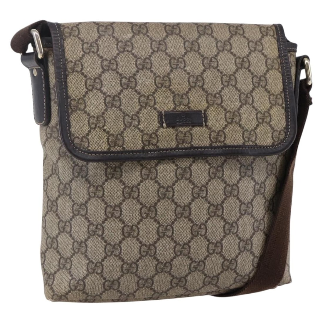 Gucci Coated Canvas Flap Messenger Bag Beige 22cm by 23cm by 4cm: Gucci Coated Canvas Flap Messenger Bag Beige 22cm by 23cm by 4cm This Gucci Flap Messenger bag features the iconic GG coated canvas in beige, designed for unisex use. It offers a compact silhouette wi