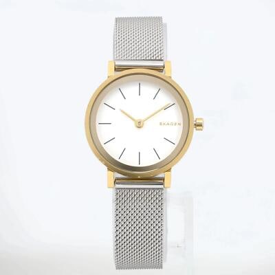 Skagen Hald ladies quartz mesh wristwatch white dial gold tone: Skagen Hald ladies quartz mesh wristwatch white dial gold tone This Skagen Hald ladies watch features a yellow gold-tone steel case, a white dial, and a mesh band. The watch is a display model and sho