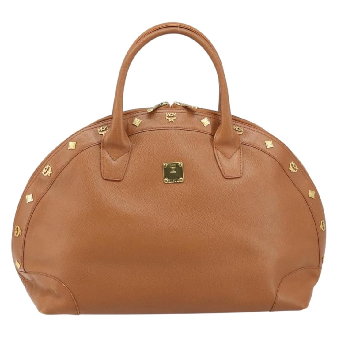 MCM Brown Leather Vintage Handbag 35cm x 27cm x 18cm Germany: MCM Brown Leather Vintage Handbag 35cm x 27cm x 18cm Germany This MCM vintage handbag is crafted from brown leather and features a classic design intended for female use. Made in Germany, it displays 