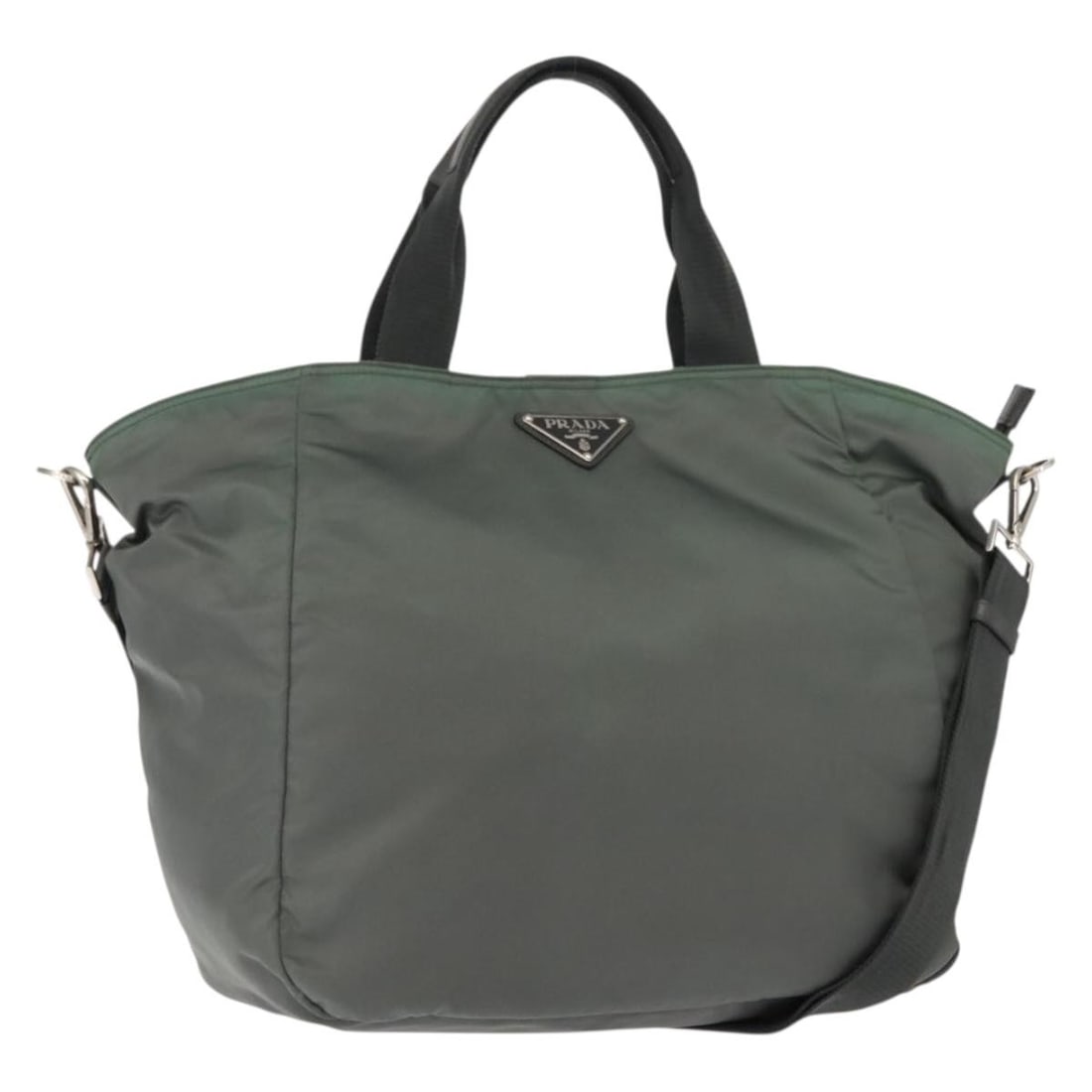 Khaki Nylon Vela Convertible Tote by Prada Italy: Khaki Nylon Vela Convertible Tote by Prada Italy The Prada Vela Convertible Tote is crafted from durable khaki nylon and designed for women. This Italian-made tote features a spacious interior and ver