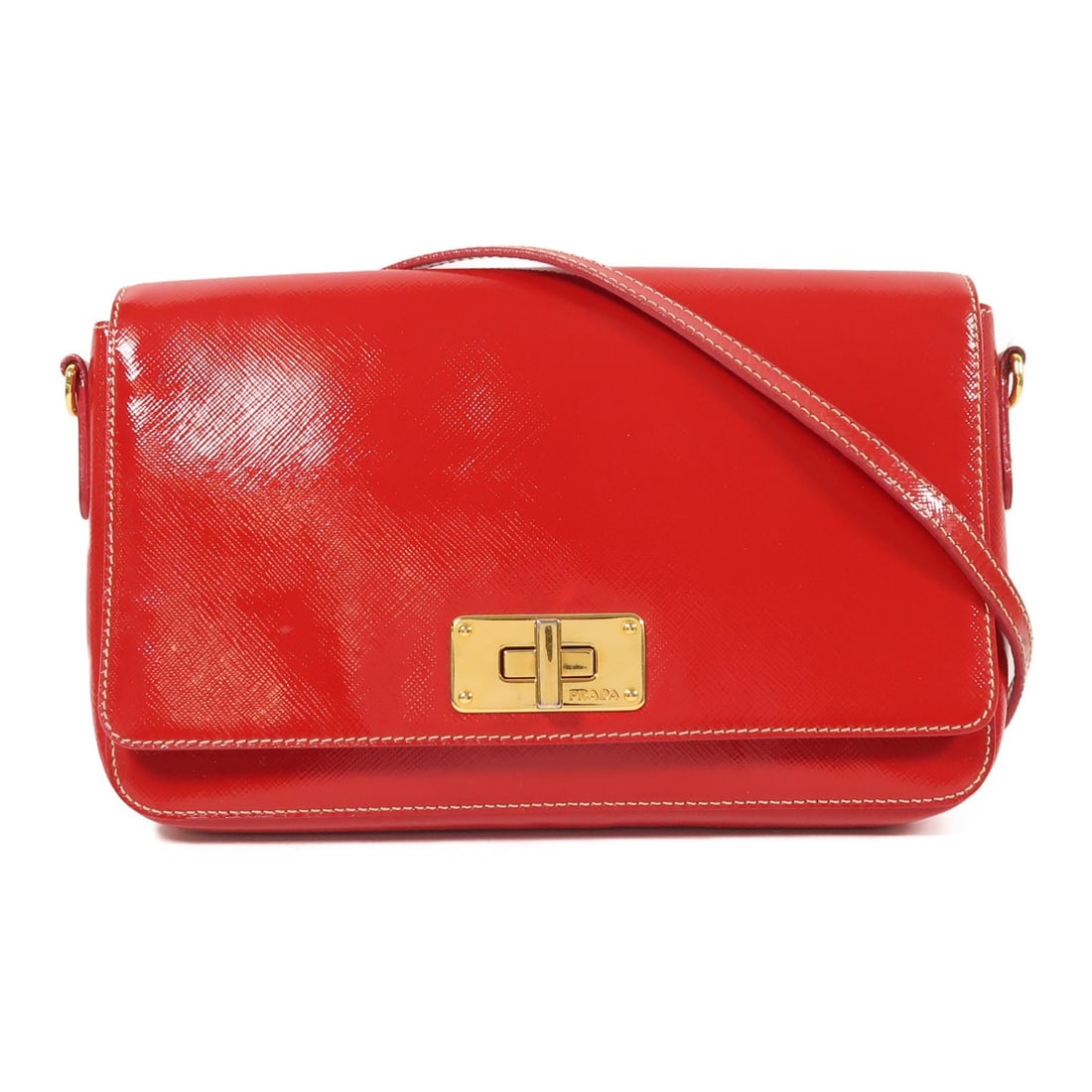 PRADA GHW Saffiano Vernice Red Shoulder Bag BT0829: PRADA GHW Saffiano Vernice Red Shoulder Bag BT0829 This PRADA shoulder bag is crafted from luxurious calfskin (cowhide) in a striking red color, making it a stylish addition to any outfit. The bag fea