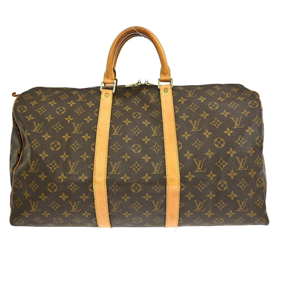 Keepall Monogram Canvas Travel Bag by Louis Vuitton: Keepall Monogram Canvas Travel Bag by Louis Vuitton The Louis Vuitton Keepall Bag in Monogram Canvas is a classic unisex travel accessory crafted from durable brown canvas. This bag features leather t