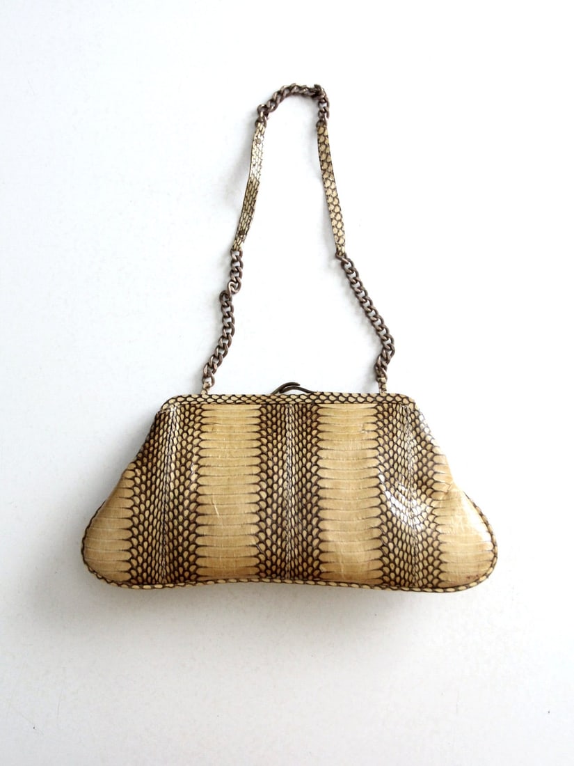 Leyla Vintage Snakeskin Clutch Shoulder Bag with Chain Strap: Leyla Vintage Snakeskin Clutch Shoulder Bag with Chain Strap This vintage Leyla shoulder bag features genuine snakeskin panels with a sculptural structured frame, showcasing the natural and unique pat