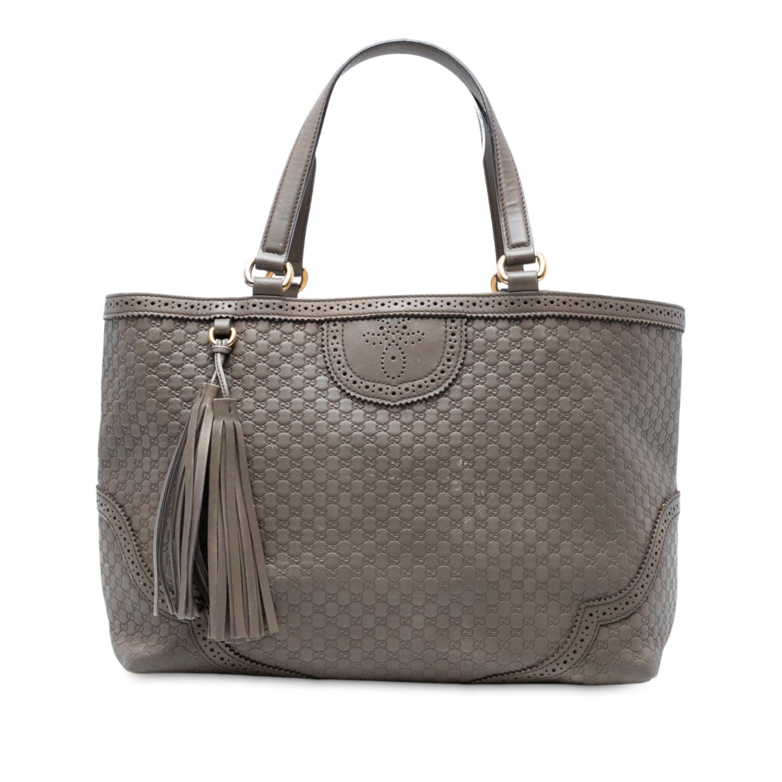 Gucci Microguccissima Leather Duilio Tote with Tassel Detail: Gucci Microguccissima Leather Duilio Tote with Tassel Detail This Gucci Large Microguccissima Brogue Duilio Tote is crafted from leather and features distinctive tassel details, flat leather handles, 