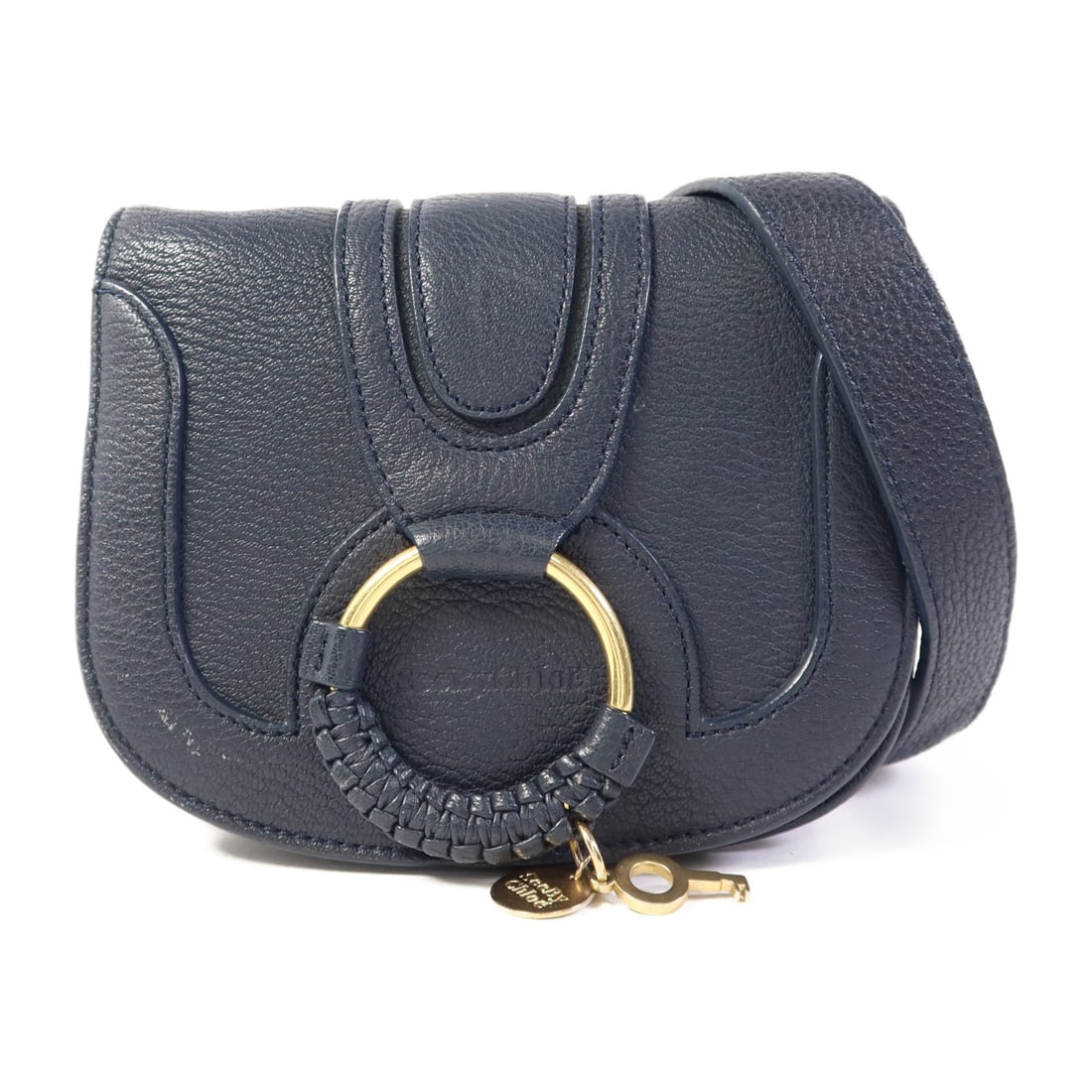 SEE BY CHLOE Navy Blue Calfskin Leather Shoulder Bag: SEE BY CHLOE Navy Blue Calfskin Leather Shoulder Bag This stylish SEE BY CHLOE shoulder bag is crafted from luxurious calfskin leather, featuring a rich navy blue exterior that adds a touch of eleganc