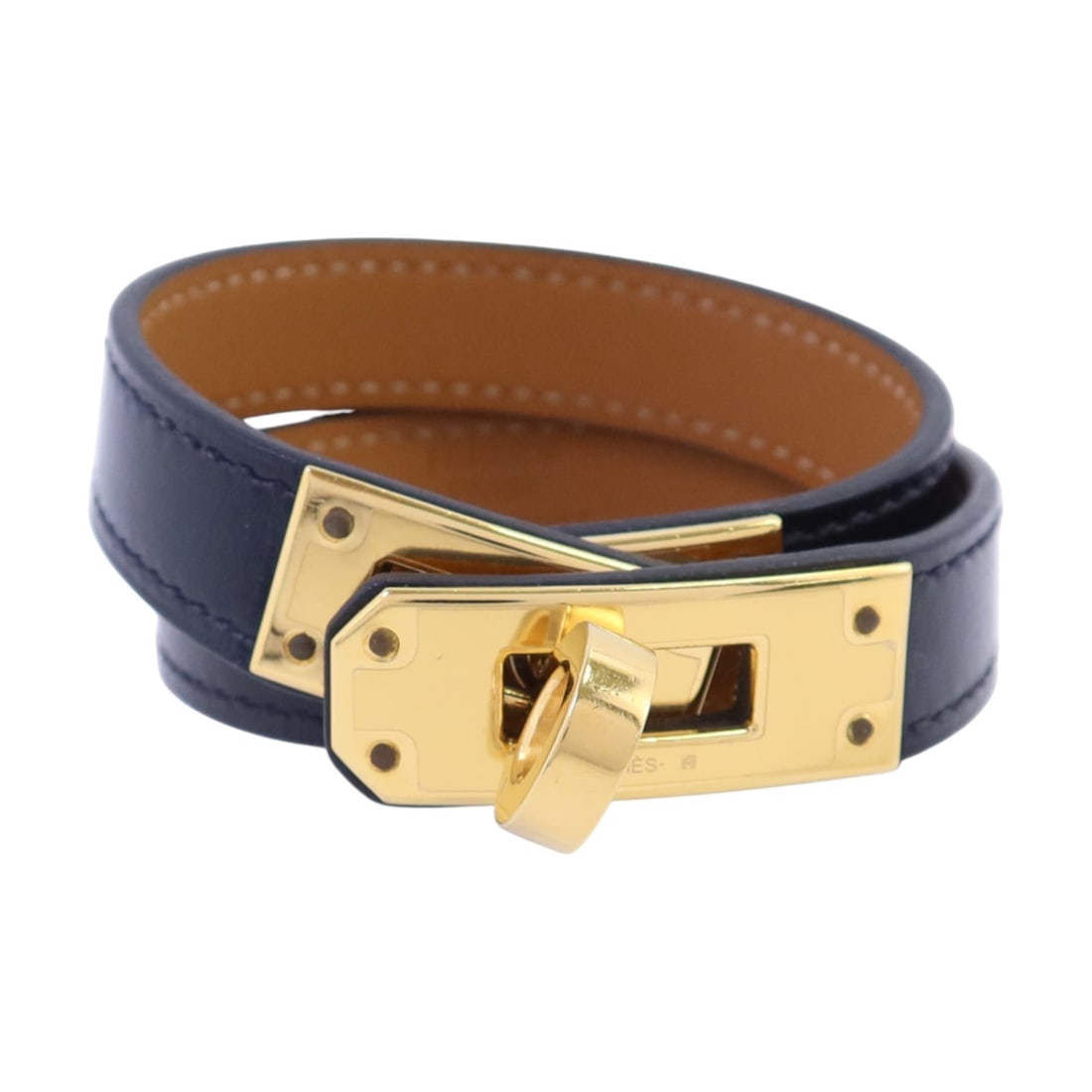 Hermes Kelly Double Tour Black Swift Leather Bracelet with Gold Hardware: Hermes Kelly Double Tour Black Swift Leather Bracelet with Gold Hardware This Hermes Kelly Double Tour bracelet features black Swift leather and a distinctive design. Crafted from calfskin, it showcas