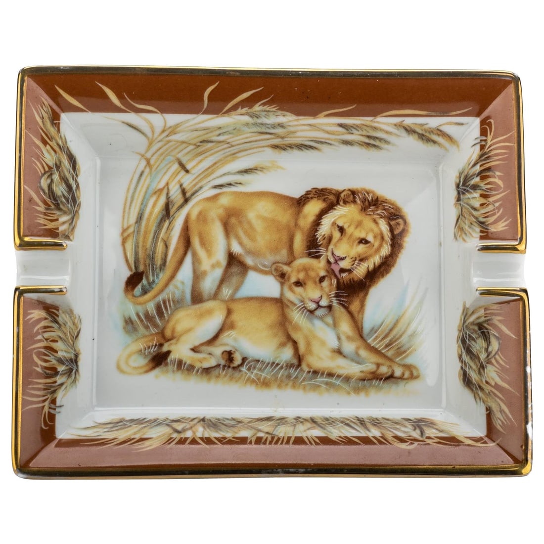Hermes Lions Design Brown Porcelain Ashtray France 21st Century: Hermes Lions Design Brown Porcelain Ashtray France 21st Century This exquisite Hermes porcelain ashtray features a striking lion design in rich brown, gold, and white colors. Crafted with precision in