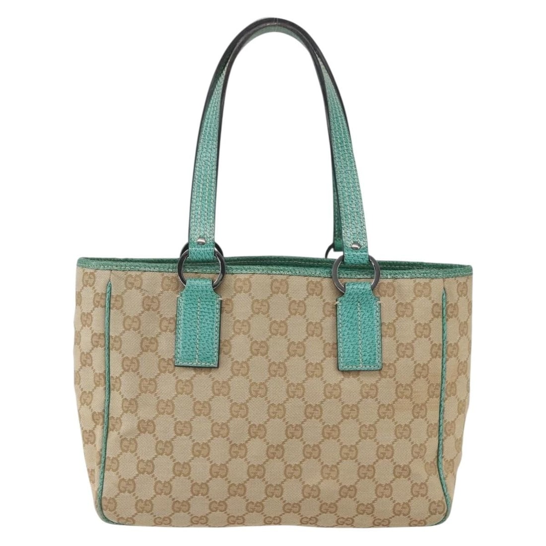 Beige Gucci Canvas Open Tote Bag 28cm by 24cm by 10cm: Beige Gucci Canvas Open Tote Bag 28cm by 24cm by 10cm This Gucci Open Tote is crafted from beige canvas with metal fittings, designed for women. The tote measures 28cm x 24cm x 10cm and is made in Ita