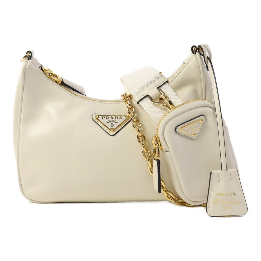 PRADA Re-Edition 2005 2Way Shoulder Bag Calfskin Leather White GHW: PRADA Re-Edition 2005 2Way Shoulder Bag Calfskin Leather White GHW This elegant PRADA Re-Edition 2005 1BH204 2Way Shoulder Bag is crafted from high-quality calfskin leather in a pristine white finish.