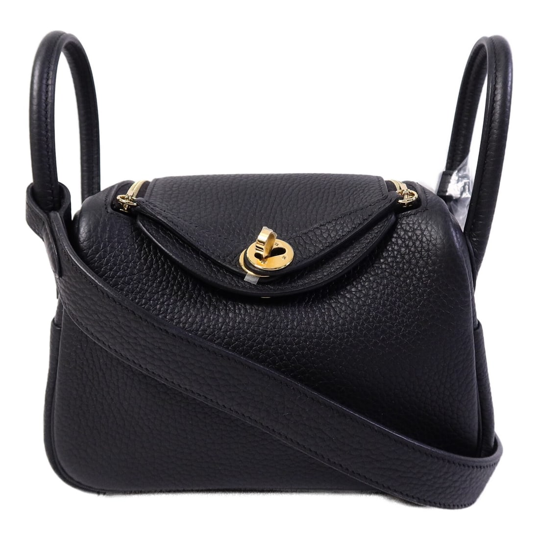 Hermes Mini Lindy II Black Calfskin 2way Shoulder Bag GHW: Hermes Mini Lindy II Black Calfskin 2way Shoulder Bag GHW This Hermes Mini Lindy II is a versatile 2-way shoulder bag crafted from luxurious Clemence calfskin leather in a classic black color. The bag