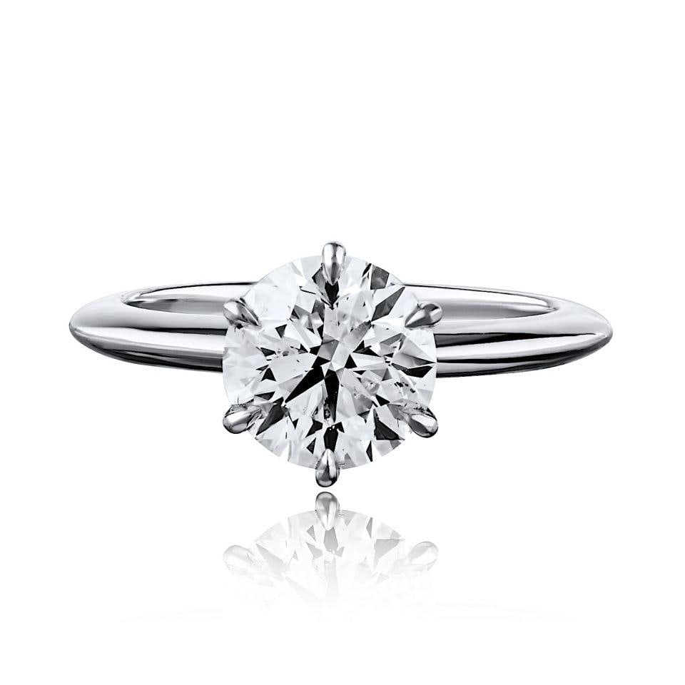 Platinum Solitaire Engagement Ring with 1.90ct D SI2 Round Diamond GIA: Platinum Solitaire Engagement Ring with 1.90ct D SI2 Round Diamond GIA This platinum ring features a classic six-prong Tiffany-style solitaire setting, showcasing a round brilliant-cut diamond. The di