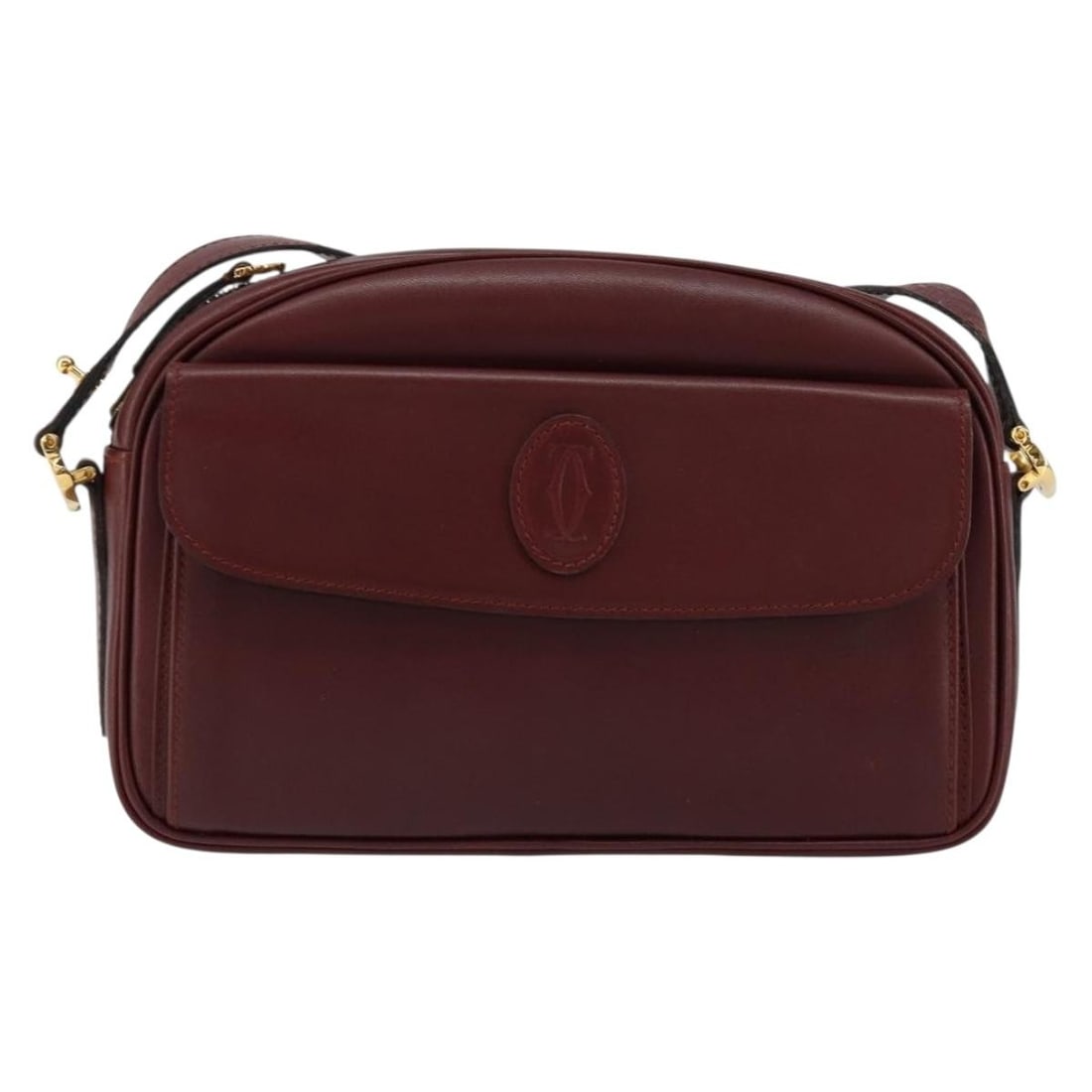 Must de Cartier Burgundy Leather Shoulder Bag by Cartier: Must de Cartier Burgundy Leather Shoulder Bag by Cartier This pre-owned Cartier Must de Cartier shoulder bag is crafted from burgundy leather and designed for women. The bag shows signs of use, includ