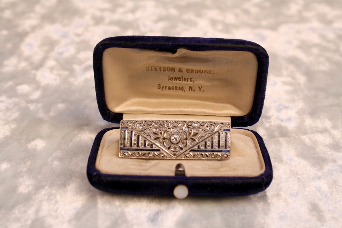 19th Century French Platinum Diamond Sapphire Brooch by Gracie Allen with Box: 19th Century French Platinum Diamond Sapphire Brooch by Gracie Allen with Box Discover this exquisite 19th century French brooch crafted from platinum, adorned with diamond and sapphire accents. This 
