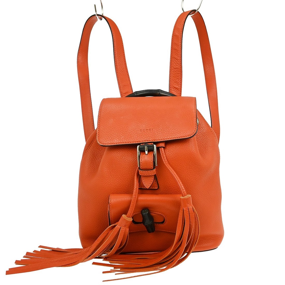 Gucci Vintage Orange Bamboo Leather Suede Backpack 387149 204990: Gucci Vintage Orange Bamboo Leather Suede Backpack 387149 204990 This vintage Gucci orange bamboo backpack combines style and functionality. Crafted from luxurious leather suede, it features a strikin