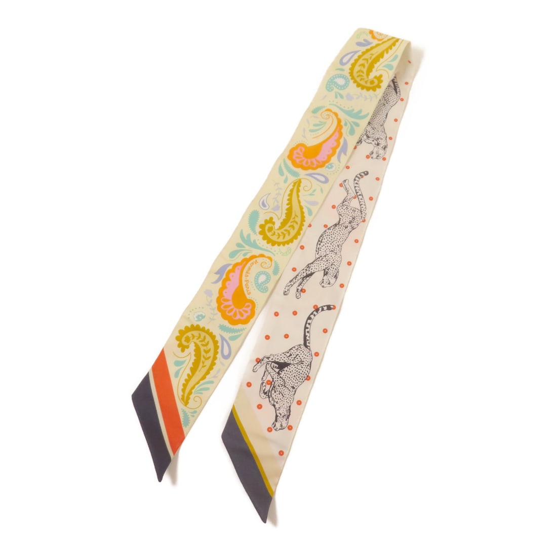 Hermes Twilly silk multicolor women scarf: Hermes Twilly silk multicolor women scarf This Hermes Twilly scarf is crafted from luxurious silk and features a vibrant multicolor design. Made in France, it is designed for women and offers a versat