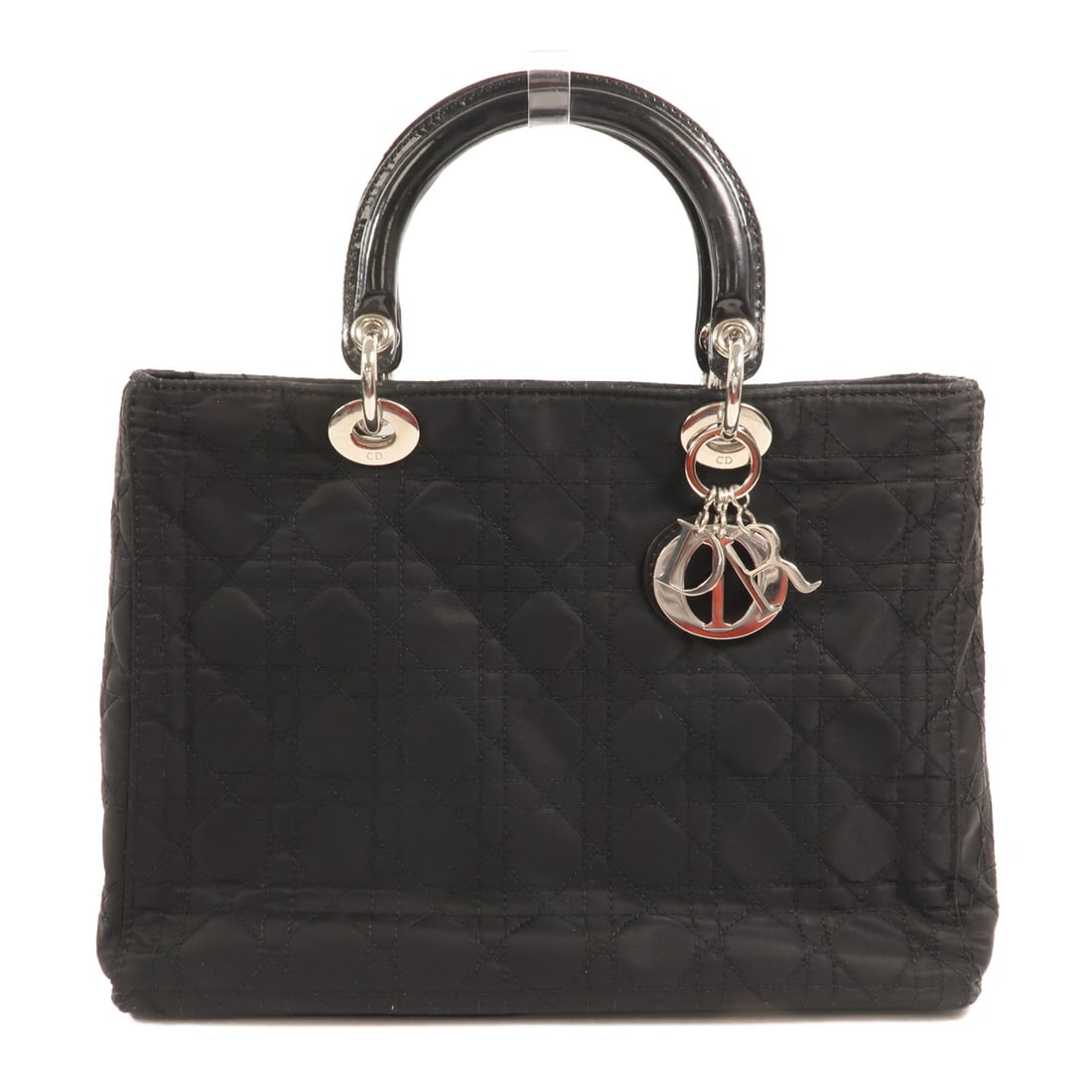 Lady Dior Black Nylon Tote Bag with Silver Tone CD Hardware: Lady Dior Black Nylon Tote Bag with Silver Tone CD Hardware This Christian Dior Lady Dior tote bag features a black nylon exterior and silver-tone hardware. Designed in a classic tote style, it offers